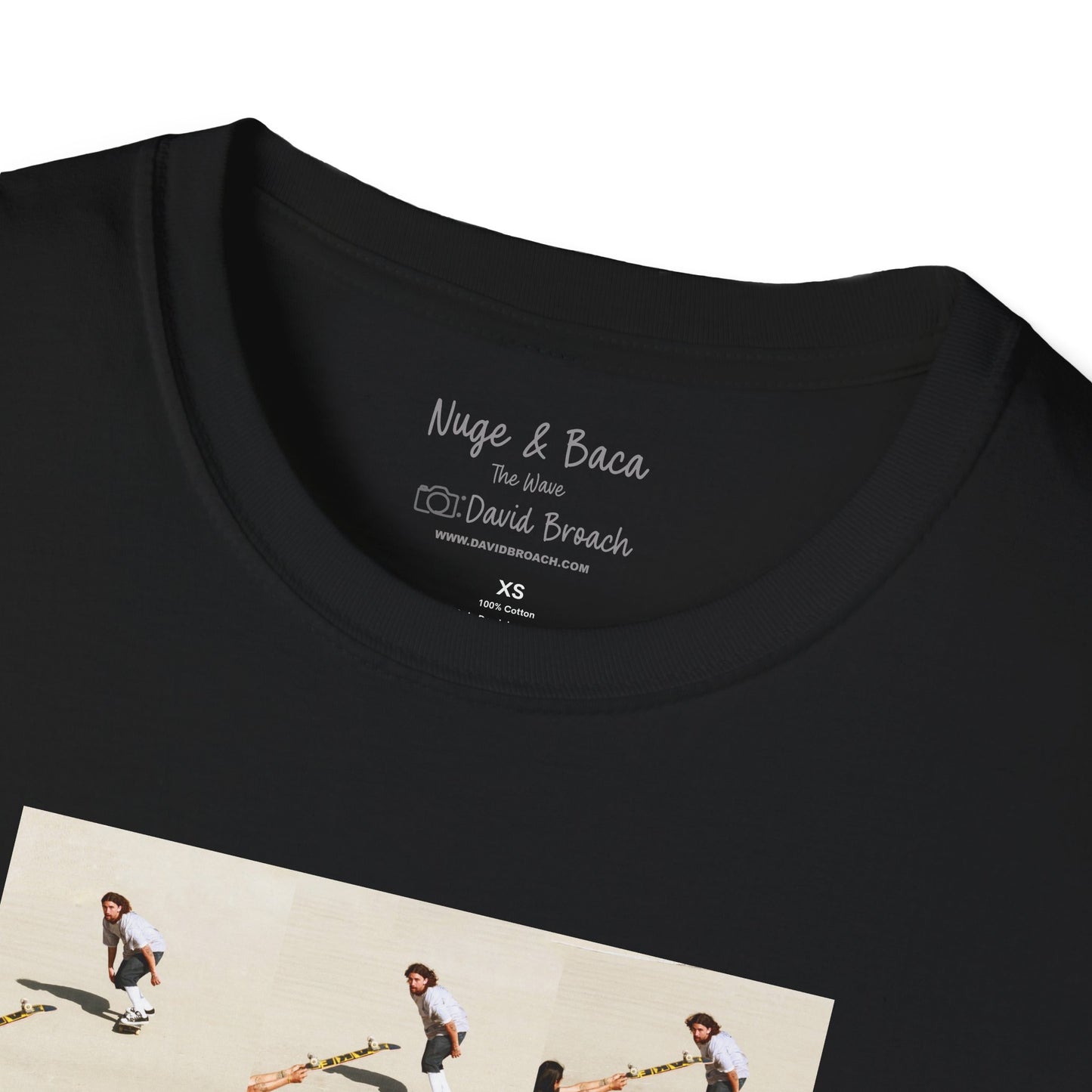Close-up of a black crew neck collar of a short-sleeve T-shirt featuring 'Sammy Baca & Don "Nuge" Nguyen' and 'Photo by David Broach' printed on the inside. A subtle yet distinctive detail that adds authenticity to the design, making it a must-have for skateboarding enthusiasts and collectors.