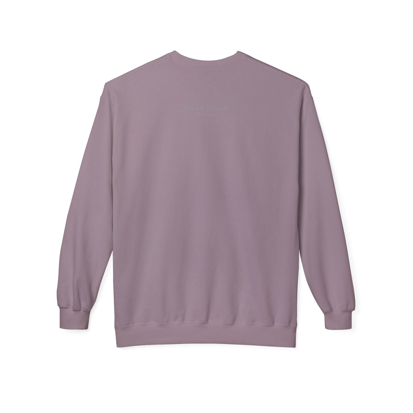 Back view of a purple long-sleeve sweatshirt.  The soft fabric drapes naturally, showcasing the relaxed fit. Ideal for layering or wearing solo, this piece adds a pop of color with a skate-inspired edge."