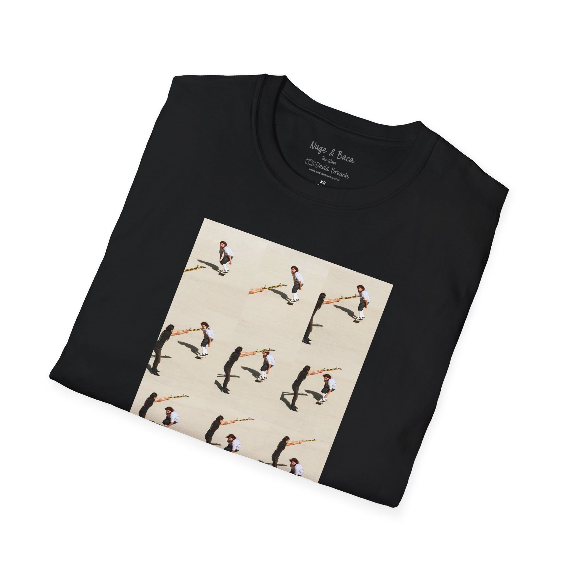 Folded Black Short-sleeve crew neck T-shirt featuring a dynamic sequence of Sammy Baca skating under a board held in the air by Don 'Nuge' Nguyen. Captured by photographer David Broach, the design playfully mimics the motion of a surfer getting barreled by a wave, blending skate and surf culture in a unique and stylish way. A must-have for skateboarding enthusiasts and streetwear fans.