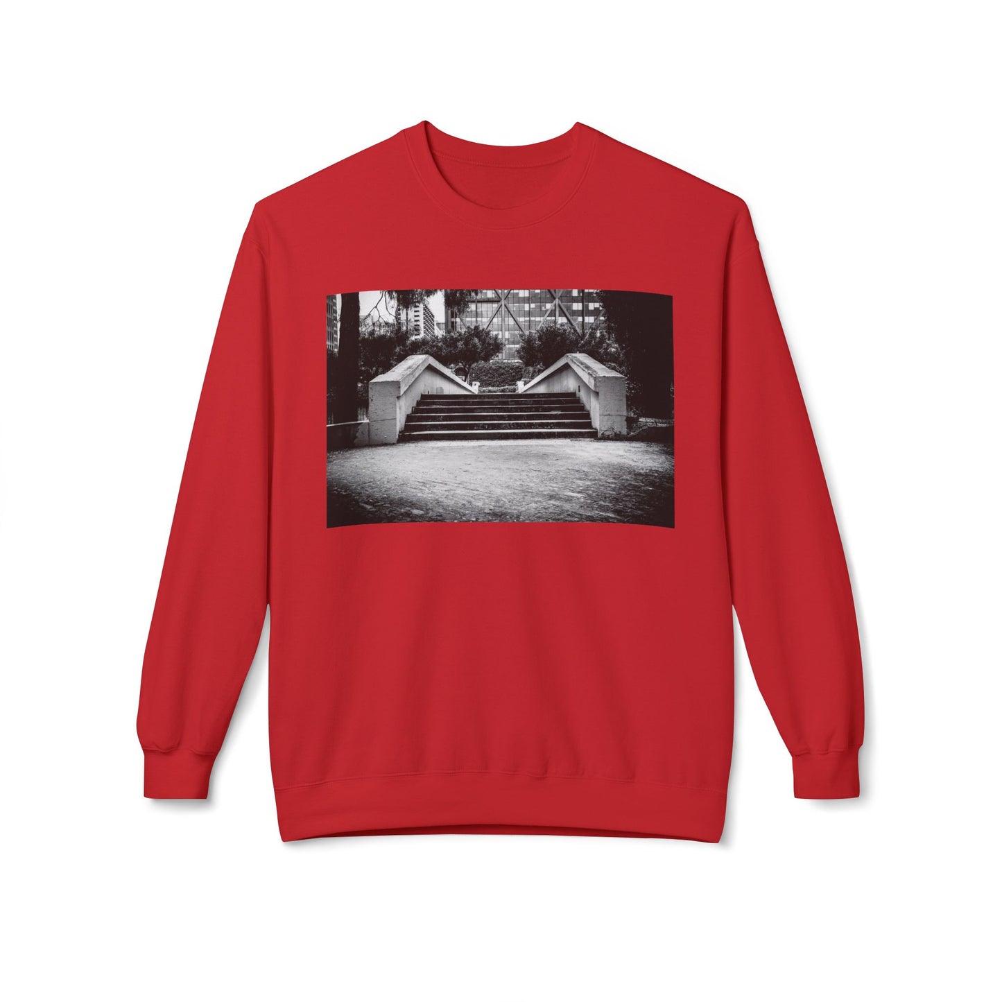 Front view of a red long-sleeve sweatshirt.  The soft fabric drapes naturally, showcasing the relaxed fit. Ideal for layering or wearing solo, this piece adds a pop of color with a skate-inspired edge."