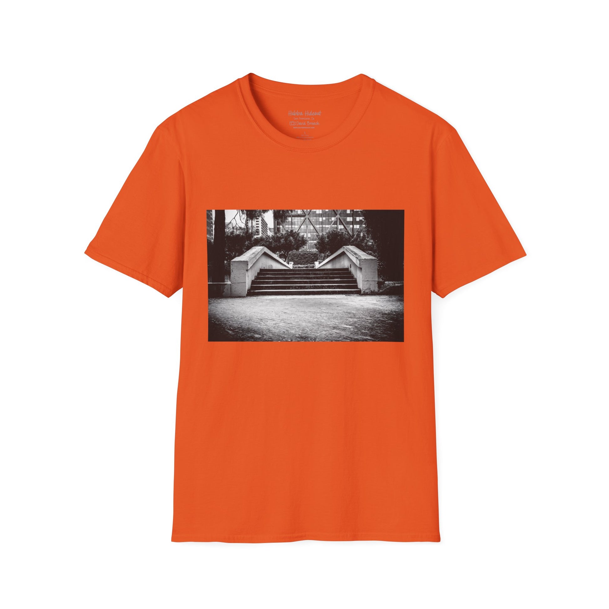 Orange Short-sleeve crew neck T-shirt featuring a bold graphic of the iconic Hubba Hideout skate spot printed on the front. The detailed design, captured by photographer David Broach, showcases the legendary spot in striking detail, making it a must-have for skateboarding enthusiasts and streetwear fans.
