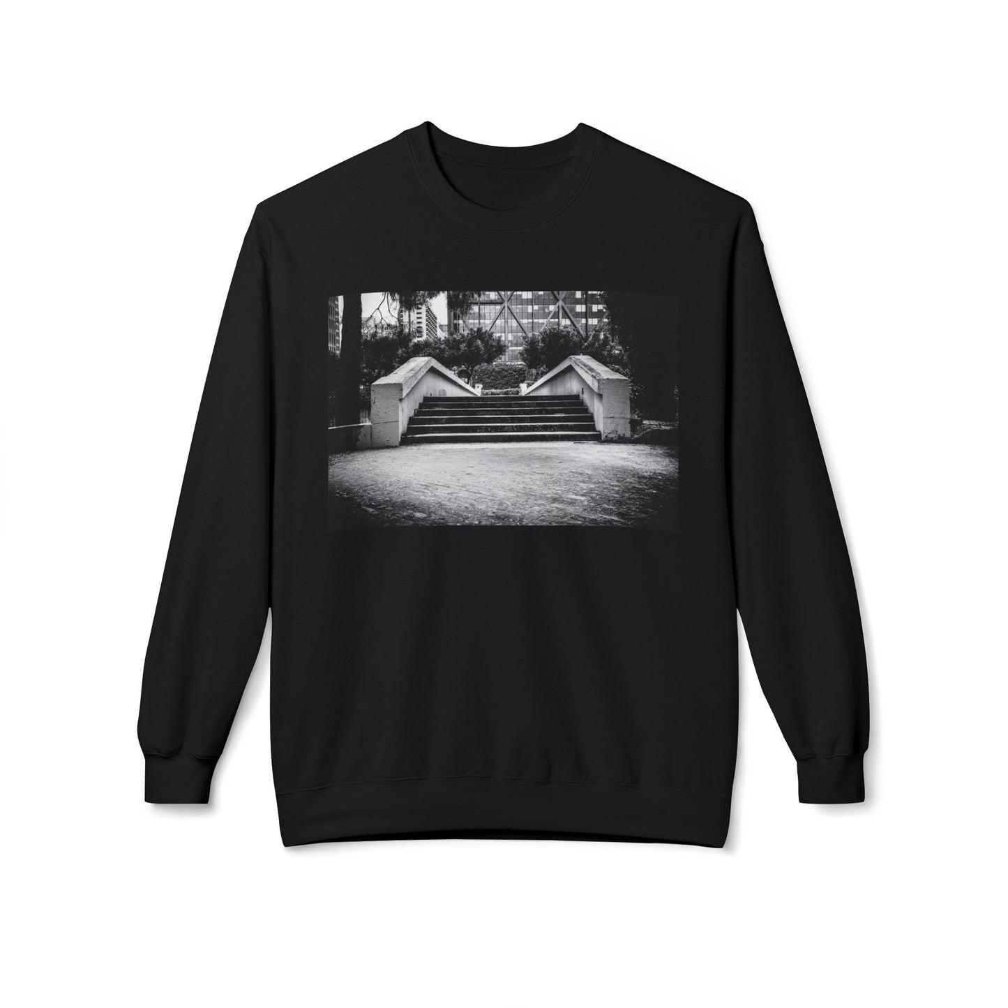 Front view of a black long-sleeve sweatshirt.  The soft fabric drapes naturally, showcasing the relaxed fit. Ideal for layering or wearing solo, this piece adds a pop of color with a skate-inspired edge."