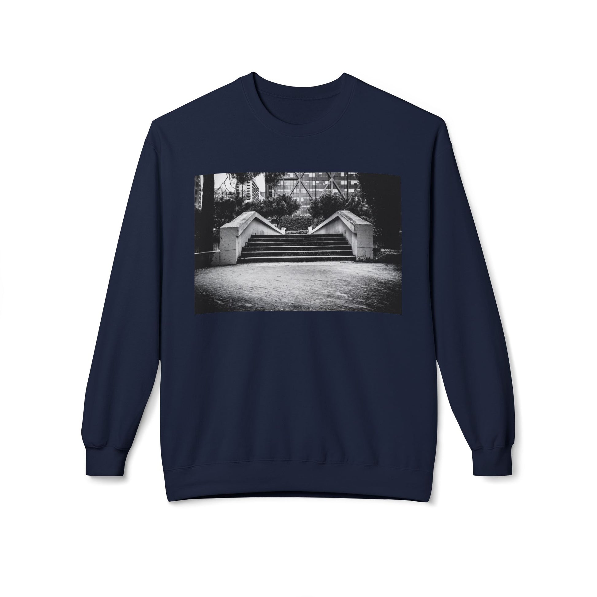 Front view of a navy blue long-sleeve sweatshirt.  The soft fabric drapes naturally, showcasing the relaxed fit. Ideal for layering or wearing solo, this piece adds a pop of color with a skate-inspired edge."