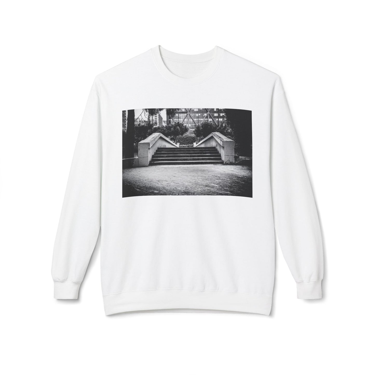Front view of a white long-sleeve sweatshirt.  The soft fabric drapes naturally, showcasing the relaxed fit. Ideal for layering or wearing solo, this piece adds a pop of color with a skate-inspired edge."
