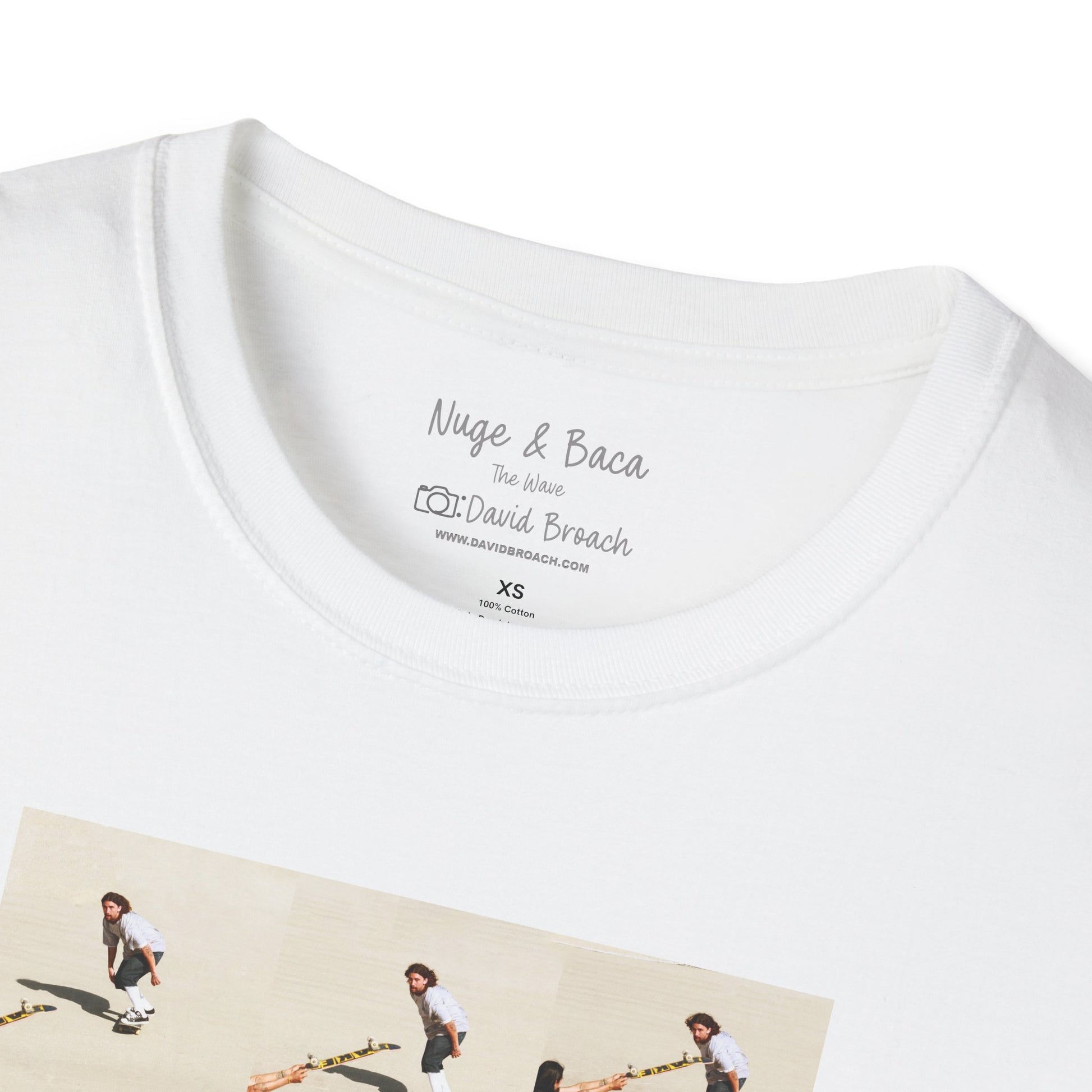 Close-up of a white crew neck collar of a short-sleeve T-shirt featuring 'Sammy Baca & Don "Nuge" Nguyen' and 'Photo by David Broach' printed on the inside. A subtle yet distinctive detail that adds authenticity to the design, making it a must-have for skateboarding enthusiasts and collectors.