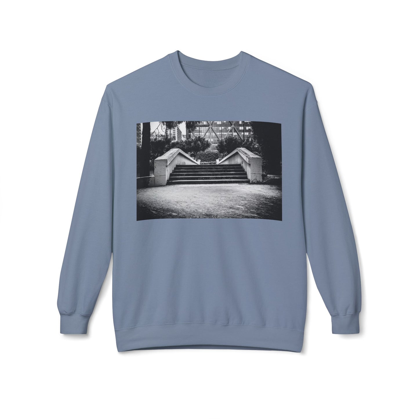 Front view of a light blue long-sleeve sweatshirt.  The soft fabric drapes naturally, showcasing the relaxed fit. Ideal for layering or wearing solo, this piece adds a pop of color with a skate-inspired edge."