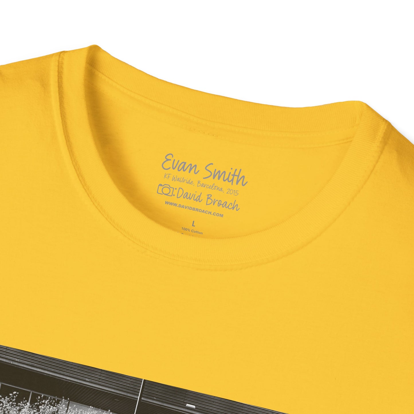 Close up of collar area yellow shirt. Printed on inside it says Evan Smith photo by David Broach