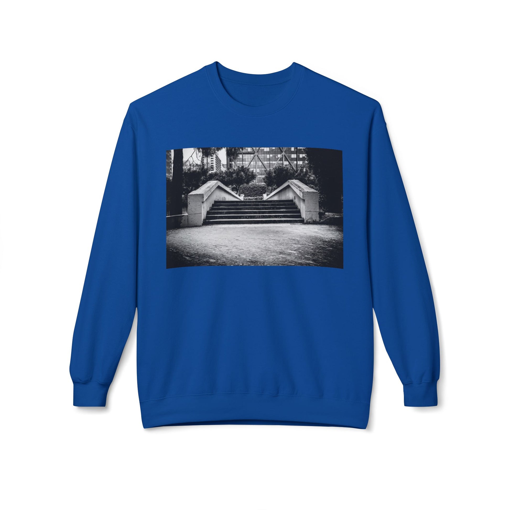 Front view of a royal blue long-sleeve sweatshirt.  The soft fabric drapes naturally, showcasing the relaxed fit. Ideal for layering or wearing solo, this piece adds a pop of color with a skate-inspired edge."