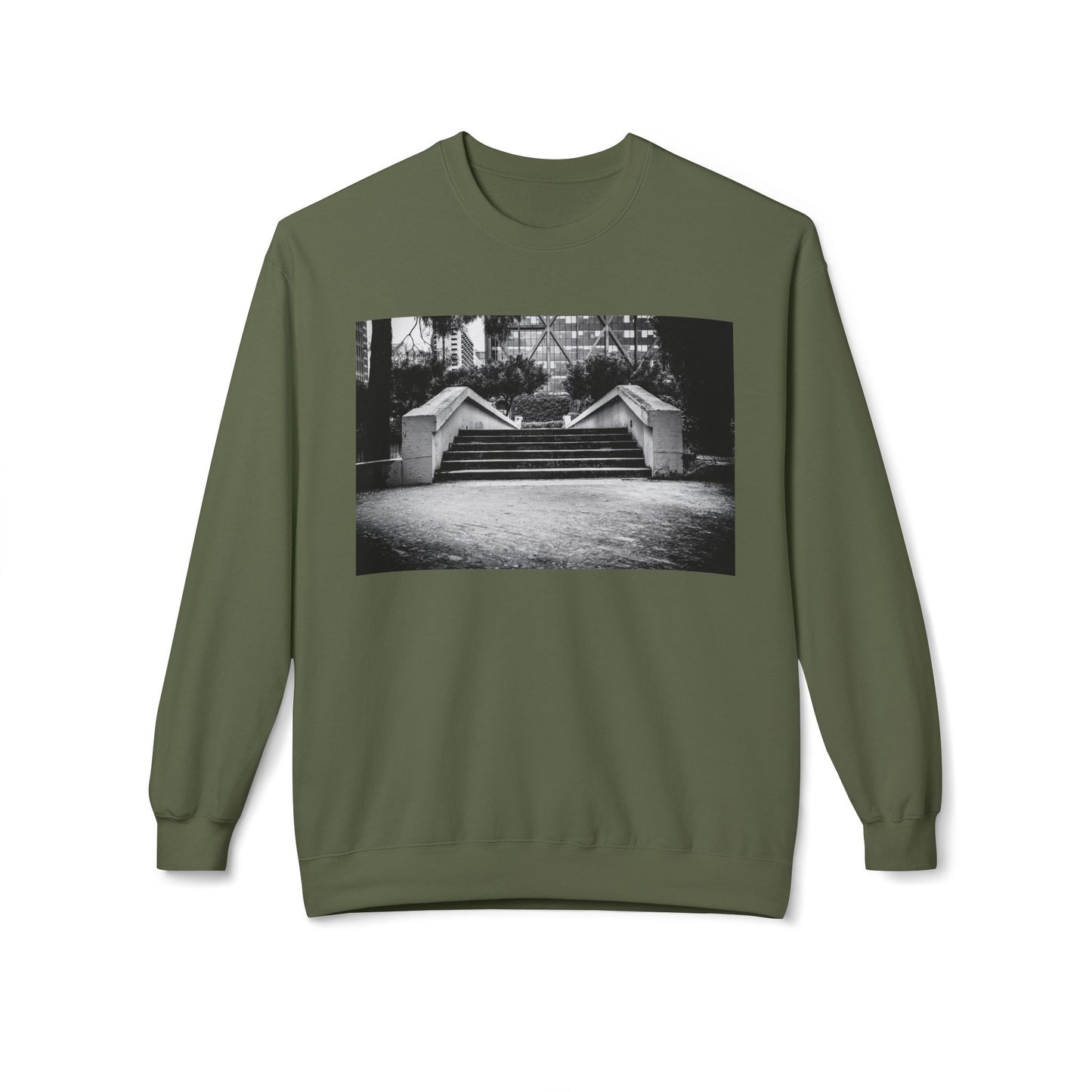 Front view of a green long-sleeve sweatshirt.  The soft fabric drapes naturally, showcasing the relaxed fit. Ideal for layering or wearing solo, this piece adds a pop of color with a skate-inspired edge."