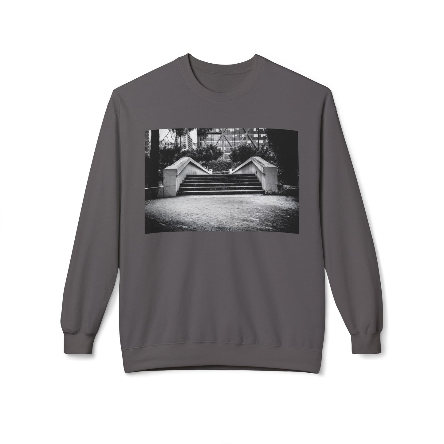 Front view of a gray long-sleeve sweatshirt.  The soft fabric drapes naturally, showcasing the relaxed fit. Ideal for layering or wearing solo, this piece adds a pop of color with a skate-inspired edge."