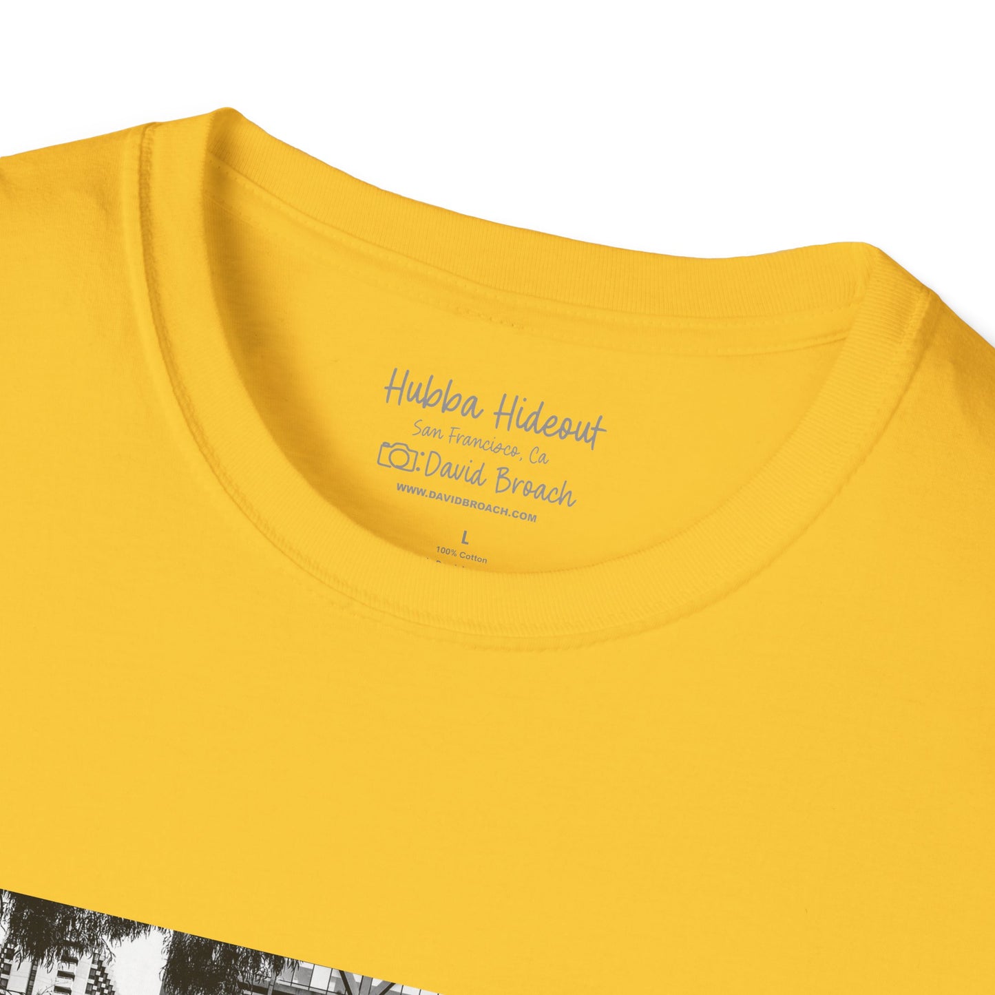 Close-up of a yellow crew neck short-sleeve T-shirt featuring a printed photo of the iconic Hubba Hideout skate spot, captured by David Broach. The detailed print highlights the texture and depth of the image, making it a bold statement piece for skateboarding enthusiasts.