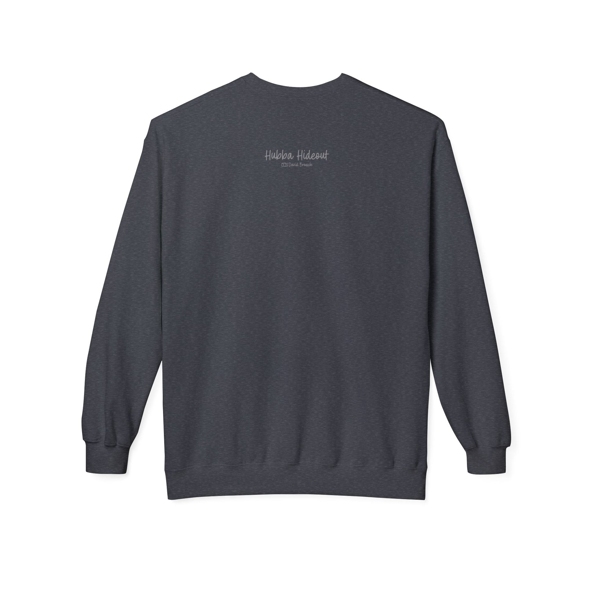 Back view of a Grey long-sleeve sweatshirt.  The soft fabric drapes naturally, showcasing the relaxed fit. Ideal for layering or wearing solo, this piece adds a pop of color with a skate-inspired edge."