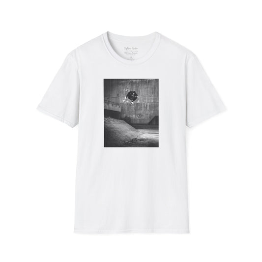 White Short-sleeve crew neck T-shirt featuring a printed photo of Dylan Rieder executing a flawless frontside heelflip off a bump in Germany. Captured by photographer David Broach and featured on the Thrasher tribute cover, this design honors Dylan’s timeless style and effortless power, making it a must-have for skateboarding enthusiasts and collectors.
