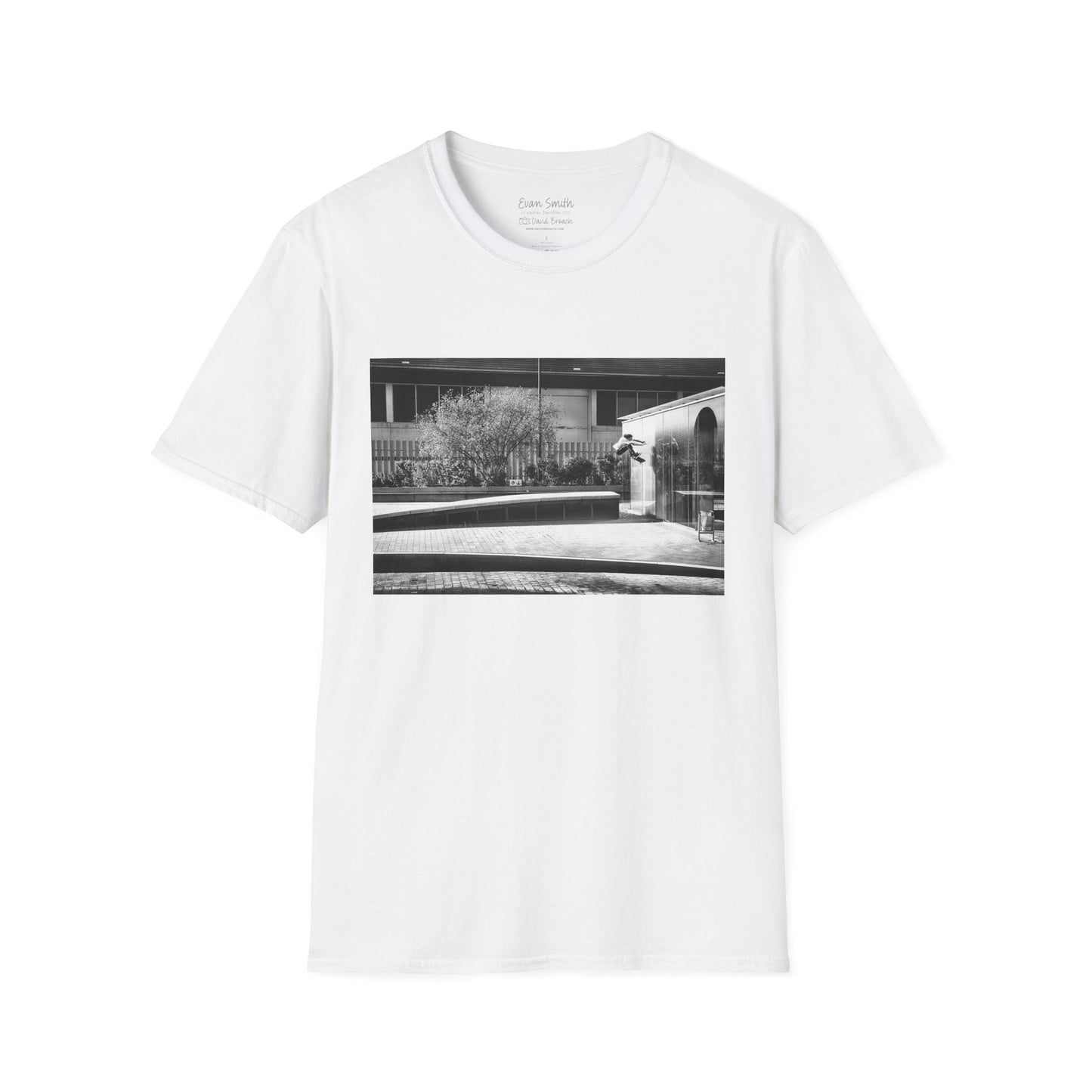 WhiteShirt with print of Black and white photo of Evan Smith doing a kick flip wallride in Barcelona Spain. Off bump onto wall.