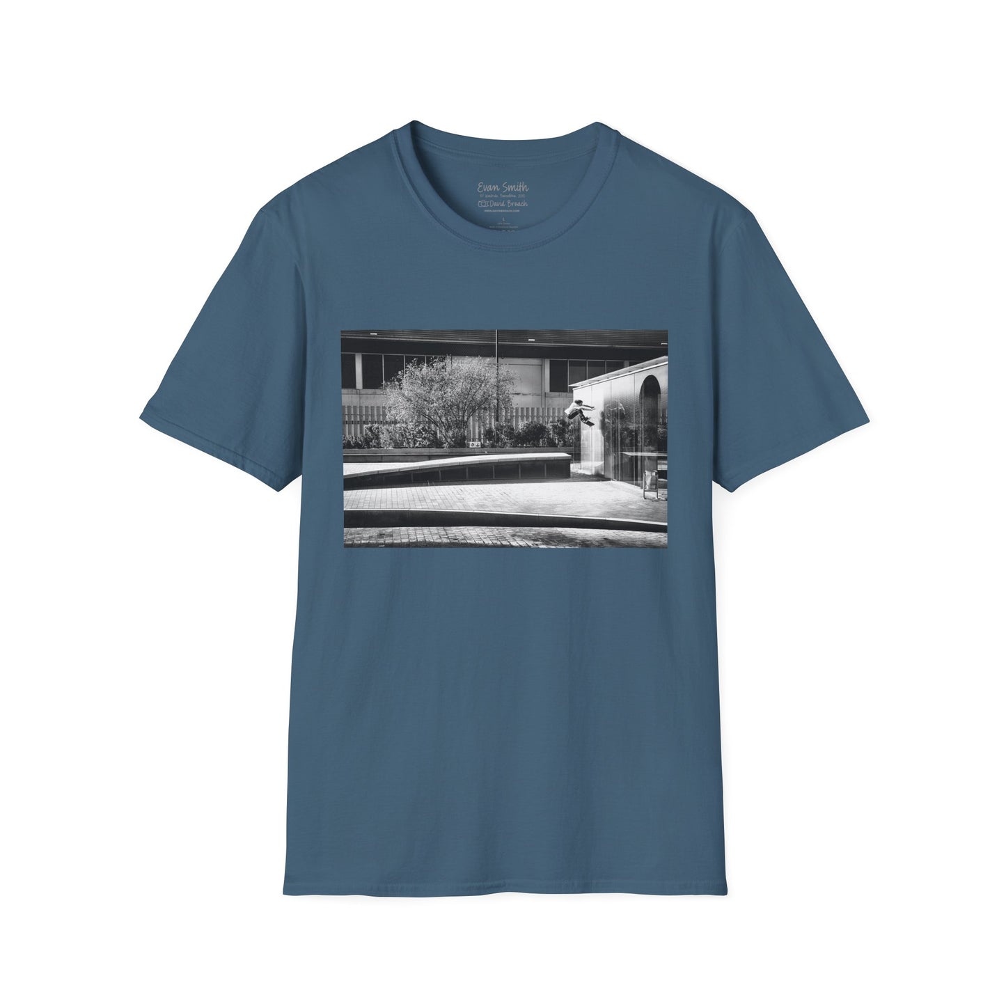 Blue Shirt with print of Black and white photo of Evan Smith doing a kick flip wallride in Barcelona Spain. Off bump onto wall.