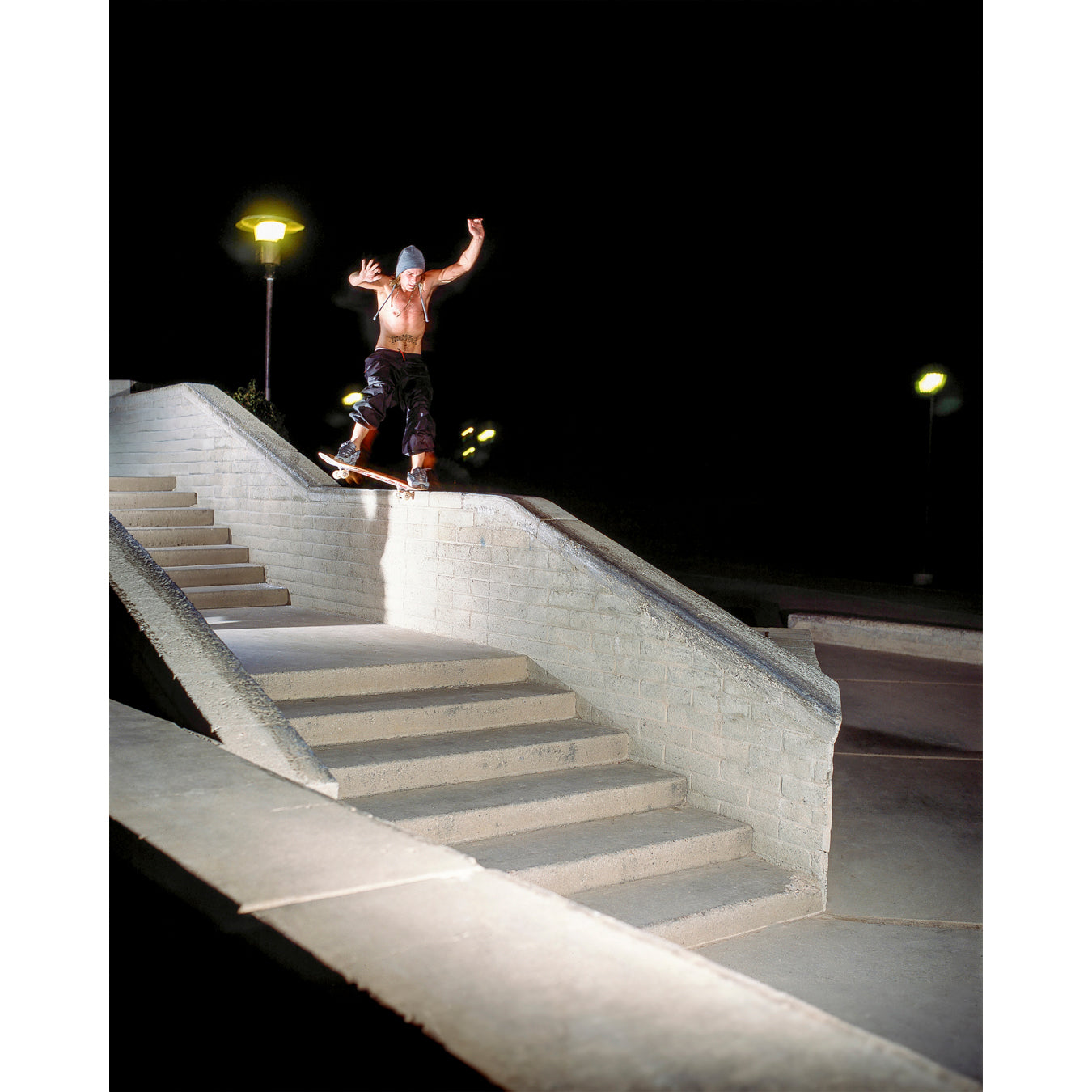 A high-quality print featuring an iconic shot of Chad Muska in 1999 executing a smooth nose slide down the triple-kink Hubba rail at The Wedge in Phoenix, Arizona. Captured by photographer David Broach, this image showcases Muska’s signature style and fearless approach, making it a must-have for skateboarding enthusiasts and collectors."