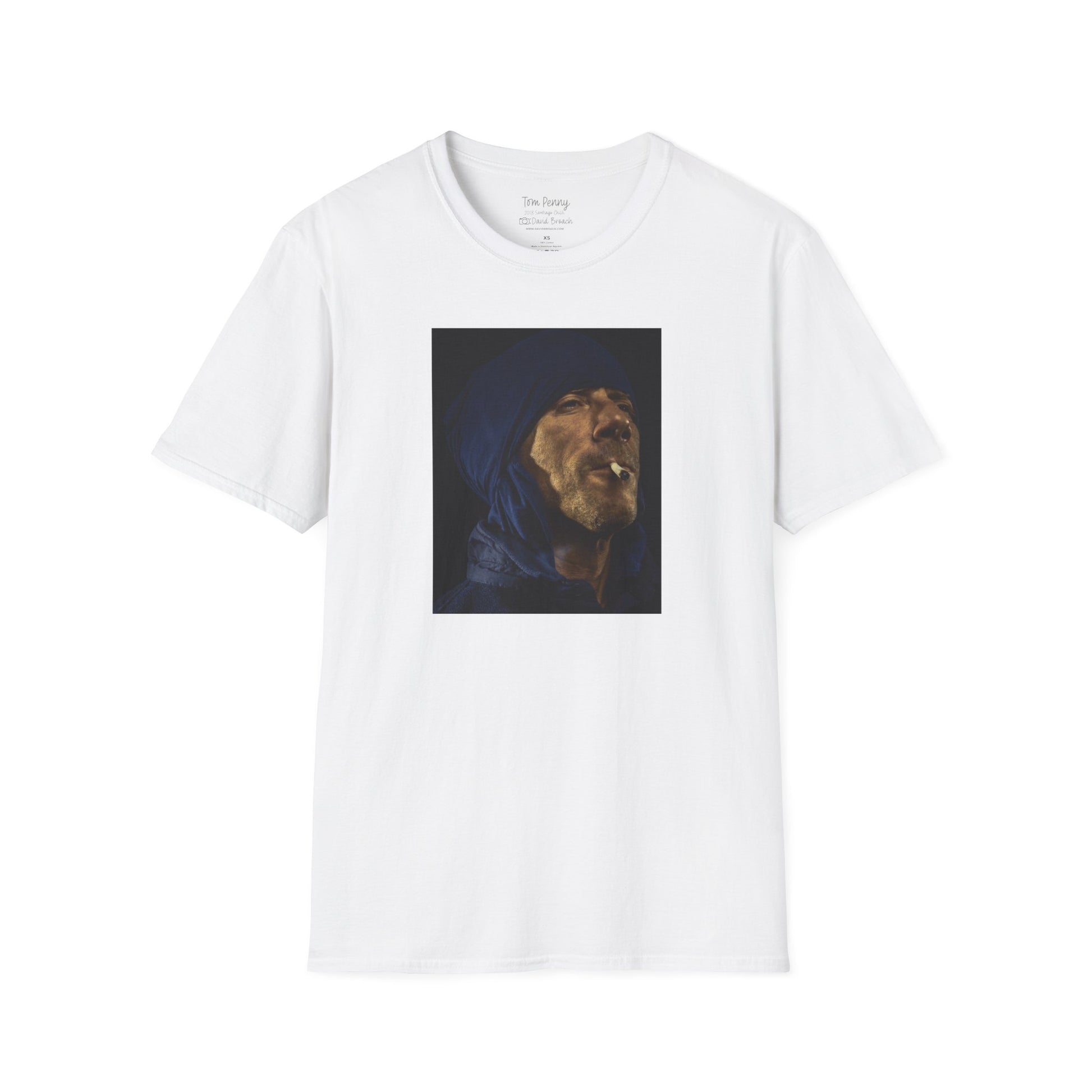 Short-sleeve white crew neck T-shirt featuring a printed portrait of legendary pro skater Tom Penny smoking a joint against a black background. Captured by photographer David Broach, the bold design highlights Penny’s effortless style and mystique, making it a must-have for skateboarding enthusiasts and streetwear fans.