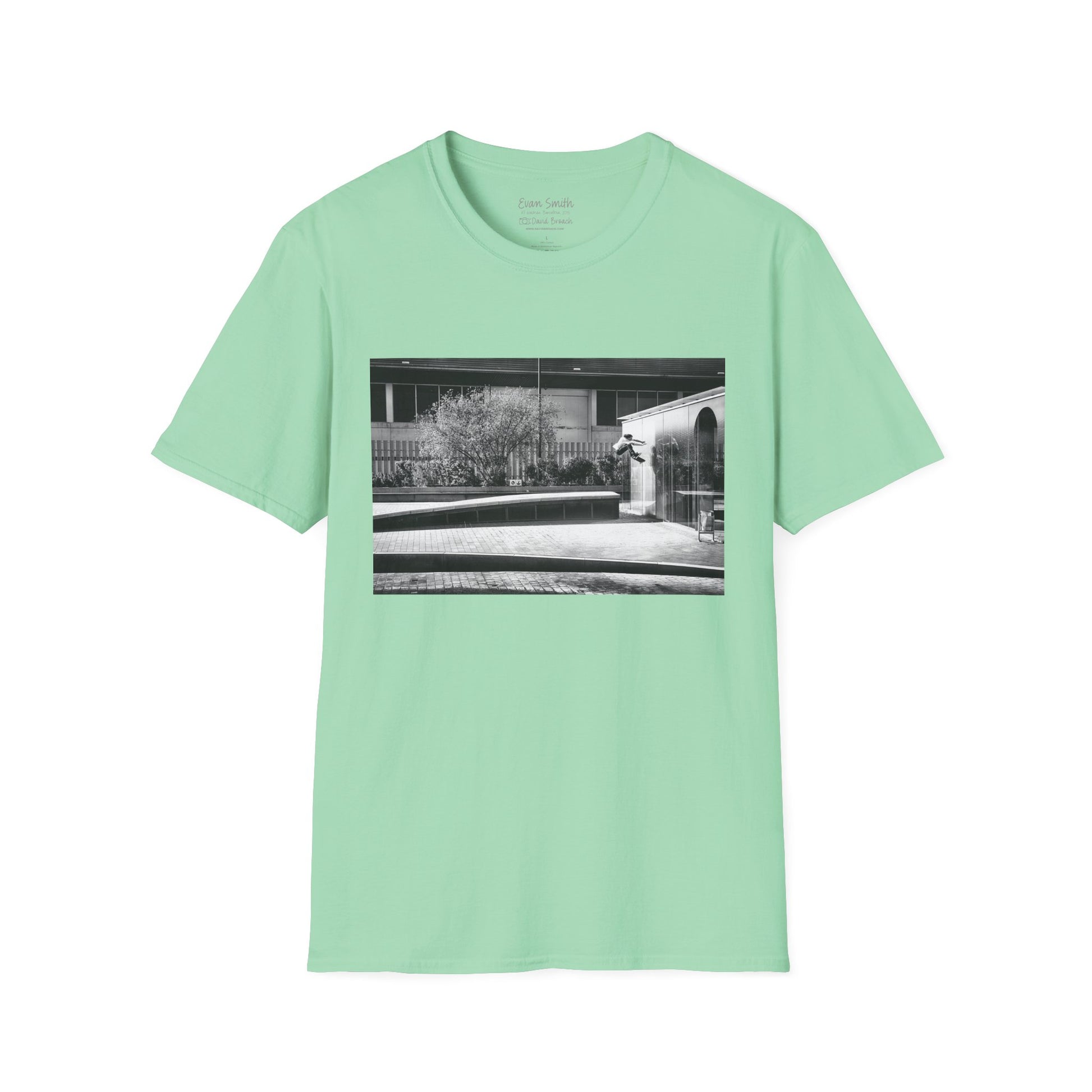 Mint green Shirt  with print of Black and white photo of Evan Smith doing a kick flip wallride in Barcelona Spain. Off bump onto wall.